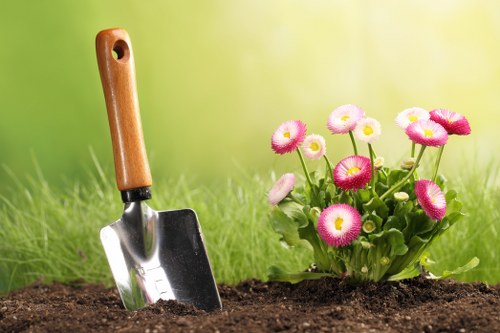 Mowing and edging a tidy lawn in Yeading